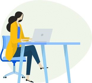 Woman siting at a table with a laptop.