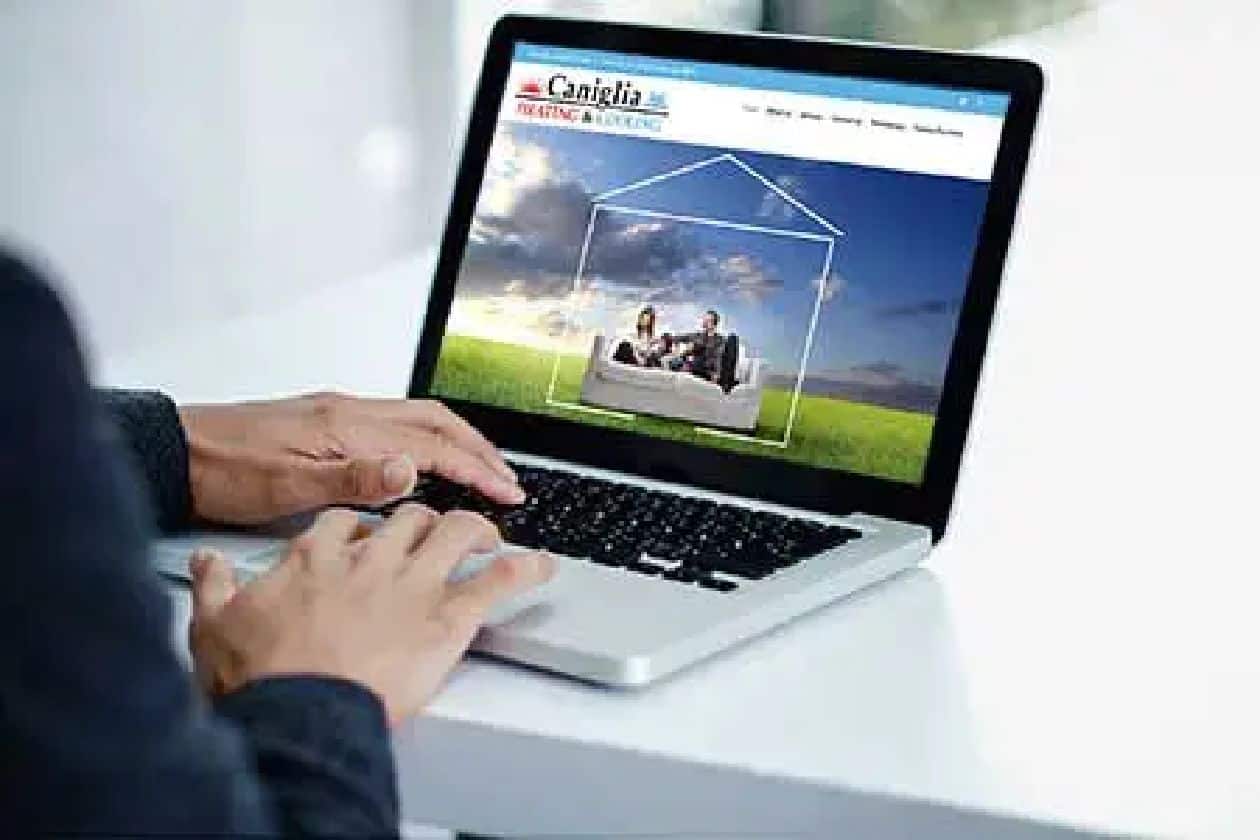 Caniglia website example on laptop
