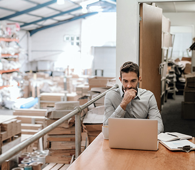 Small business owner storing product