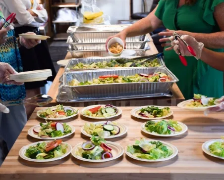 Plates of food set out for people