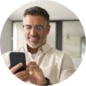 Man happy at the search results on his phone