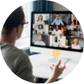 Team having remote meeting on computer